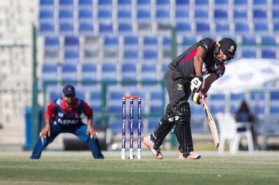 UNITED ARAB EMIRATES-ABU DHABI: UAE's Ghulam Shabber, (R) bats during Match UAE vs Nepal, ICC World Cricket League Championship at Abu Dhabi, Dec 6 2017 on December 6, 2017, NEZAR BALOUT
