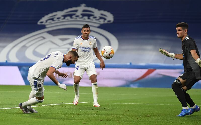 Karim Benzema of Real Madrid scores a goal which was later disallowed for offside during the La Liga match against Celta Vigo at Santiago Bernabeu on September 12, 2021 in Madrid.  Getty Images