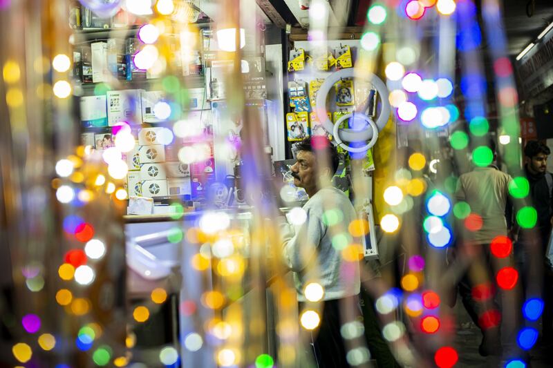 A customer buys Diwali lights in New Delhi. In the previous two years, the coronavirus pandemic has curtailed celebrations. Bloomberg