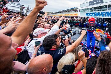 Toro Rosso's Daniil Kvyat celebrates with his teammates after the German Grand Prix at Hockenheim on Sunday. Getty