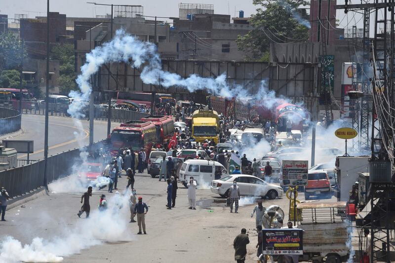 Police use tear gas to disperse activists in Lahore. AFP