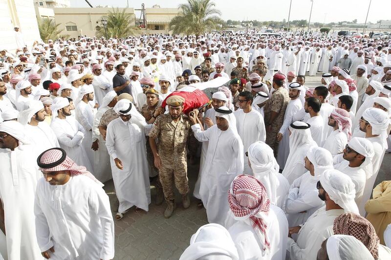 The bodies of 12 of the UAE’s fallen heroes were taken inside the mosque for prayers. Huge crowds came to pay their last respects to these heroes. Jeffrey E Biteng / The National