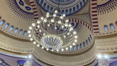 The chandeliers that hang above worshippers at Al Farooq Omar Bin Al Khattab Mosque in Dubai. Antonie Robertson / The National