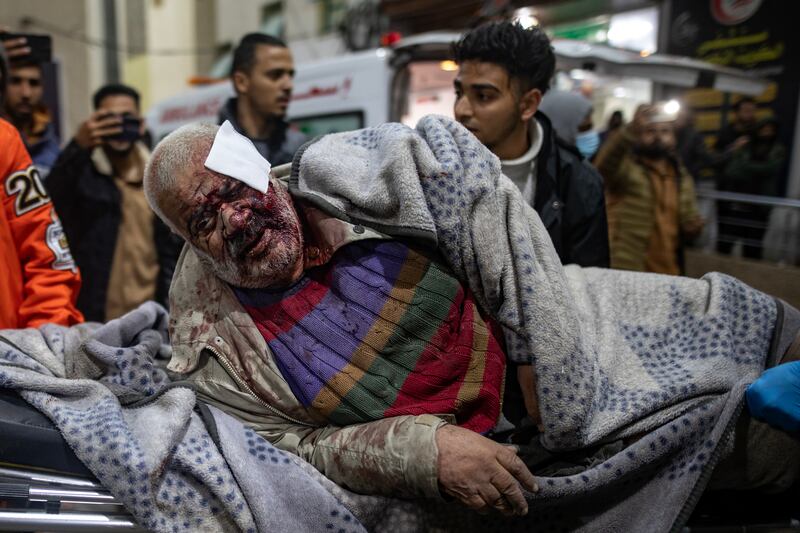 Wounded people are transported to Kuwait Hospital in Rafah following Israeli air strikes. EPA
