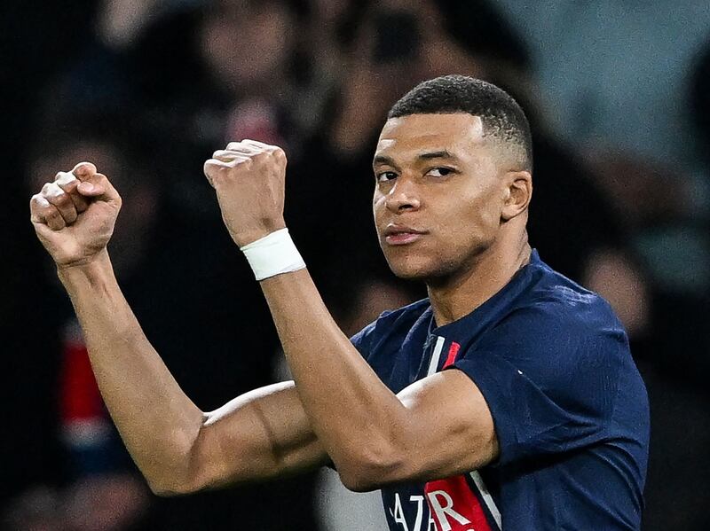 Paris Saint-Germain forward Kylian Mbappe celebrates after scoring against Real Sociedad in the Champions League at Parc des Princes, on February 14, 2024. AFP