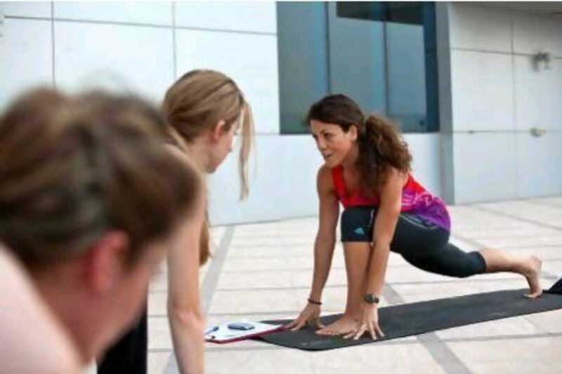 Noura El Imam teaches outdoor yogalates -a mix of yoga and pilates- during the summer months at Frasier Suites in Media City.