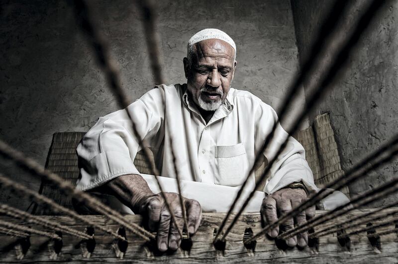 Photo by Ibrahim Salman of carpenter Bou Ahmed at work in a profession that has lasted more than 35 years. Courtesy National Geographic Abu Dhabi