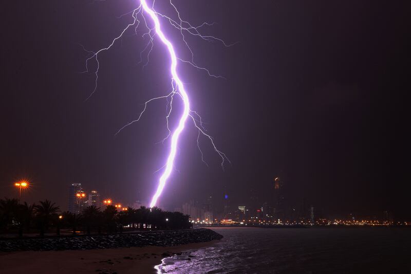 Lightning strikes over Kuwait City during a thunderstorm. AFP