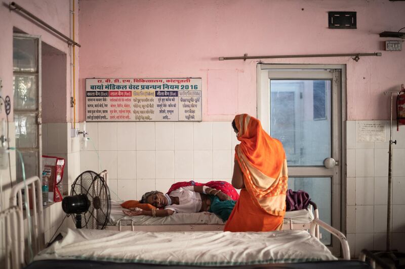 An Indian coronavirus patient is treated with oxygen in a designated ward at the BDM Government Hospital in Kotputli, Jaipur district, Rajasthan. The hospital is treating 50 people across three wards set aside for Covid-19 patients. Getty Images