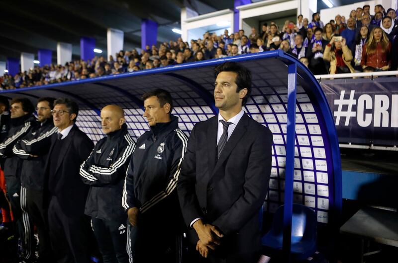 Real Madrid's interim coach Santiago Solari, right, waits for the start of the match. AP Photo