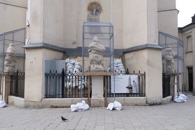 Statues wrapped and caged for protection in the Ukrainian city of Lviv. Photo: Oliver Raw