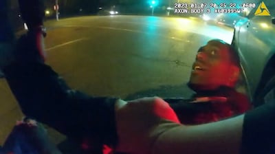 A still image from bodycam video shows Tyre Nichols being ordered to get on the ground by police officers. AFP