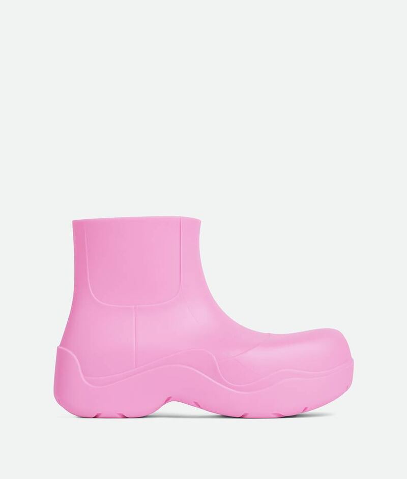 Ugg-style boots: Puddle ankle boot, Dh3,010, Bottega Veneta