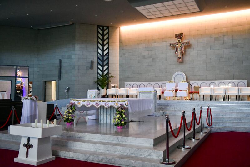 Arrangements inside the Cathedral of our Lady of Arabia for the visit. Khushnum Bhandari / The National