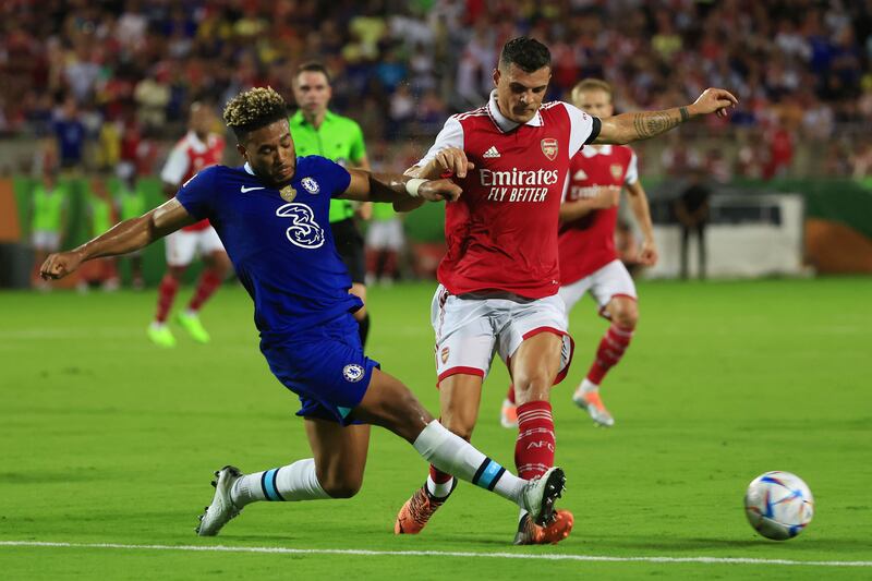 Chelsea full-back Reece James tackles Arsenal midfielder Granit Xhaka. Getty
