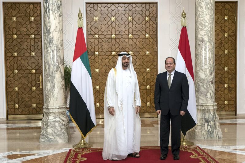 CAIRO, EGYPT - August 07, 2018: HH Sheikh Mohamed bin Zayed Al Nahyan Crown Prince of Abu Dhabi Deputy Supreme Commander of the UAE Armed Forces (L), stands for a photograph with HE Abdel Fattah El-Sisi President of Egypt (R), at the Heliopolis Palace.
( Rashed Al Mansoori / Crown Prince Court - Abu Dhabi )
---