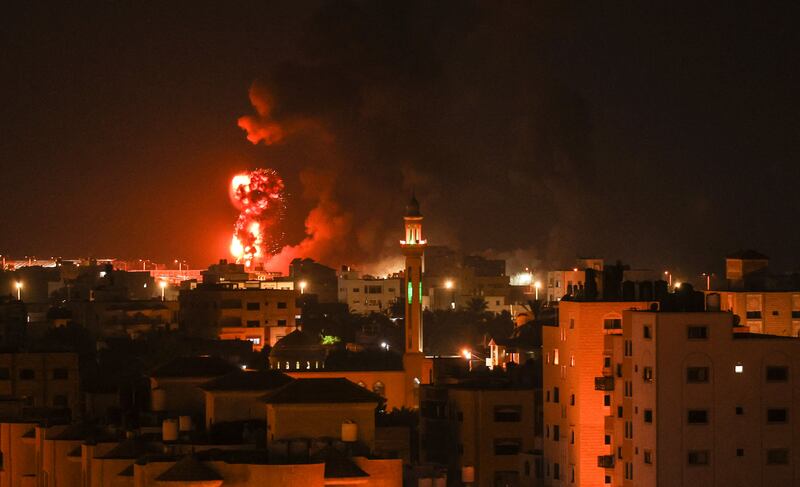 Fires are seen following an Israeli airstrike in Gaza city. AFP