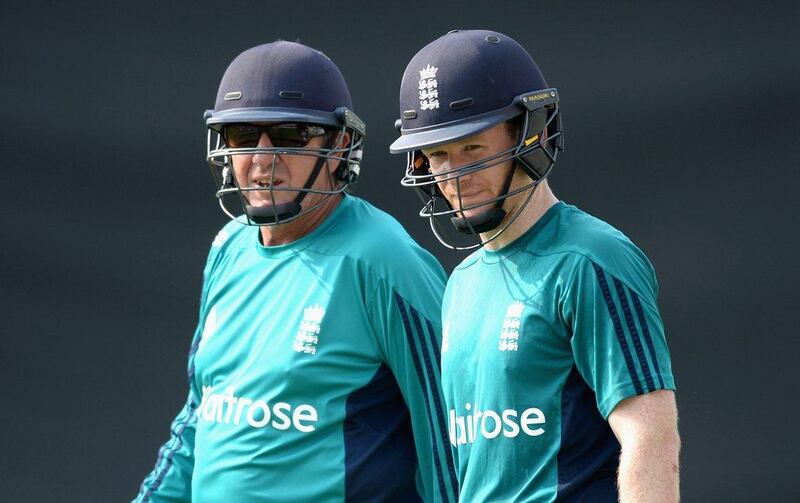 England captain Eoin Morgan, right, alongside England captain Trevor Bayliss during practice ahead of the World Twenty20 final. Gareth Copley / Getty Images