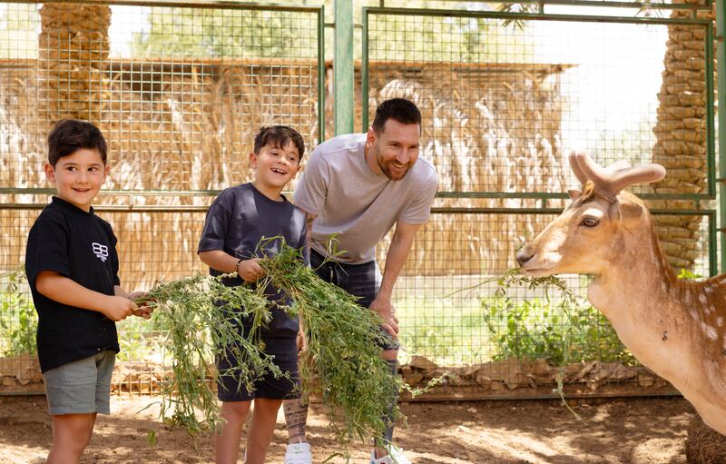 Lionel Messi and his sons visited a Saudi farm where they interacted with an Arabian Gazelle. Photo: Saudi Tourism Authority