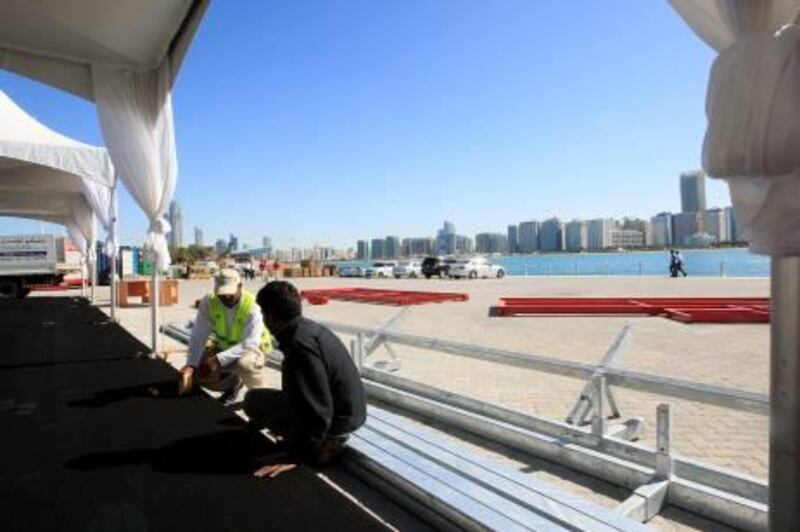 ABU DHABI - 22DEC2011 - Preparation for Volvo Ocean race in progress along the breakwater on Corniche in Abu Dhabi. Ravindranath K / The National