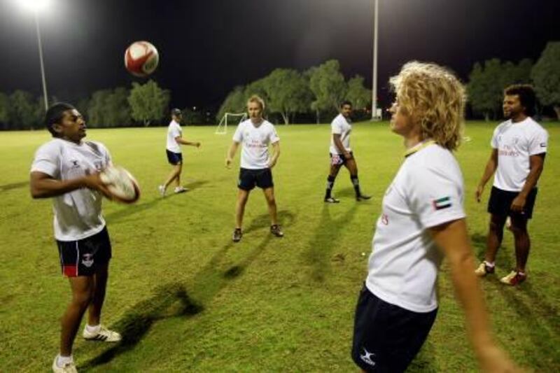 Dubai,  United Arab Emirates- November 28,  2010:  Dubai Rugby Sevens team  player (L)  Emad Reyal  during the practise session at the Jebel Ali Primary School grounds in Dubai .   (  Satish Kumar / The National ) For Sports