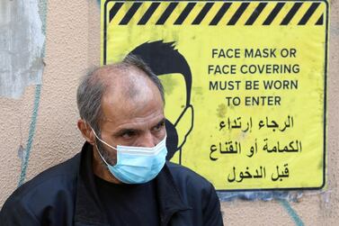 A man wearing a protective face mask waits to get tested for the coronavirus disease in Beirut, Lebanon. Reuters