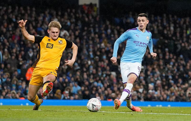 Soccer Football - FA Cup - Third Round - Manchester City v Port Vale - Etihad Stadium, Manchester, Britain - January 4, 2020  Manchester City's Phil Foden scores their fourth goal   REUTERS/Andrew Yates