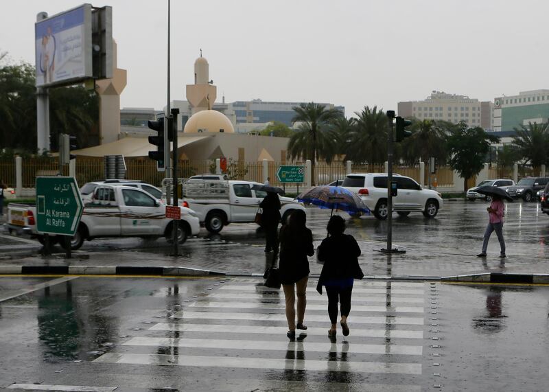 Dubai, United Arab Emirates - March 21, 2017.   Rain all over the city, like here in Al Karama.  (  Jeffrey E Biteng / The National ) *** Local Caption ***  JB210317-Rain03.jpg