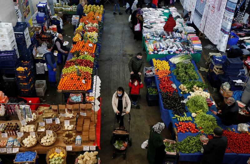 Shoppers at an open market in Istanbul. Reuters