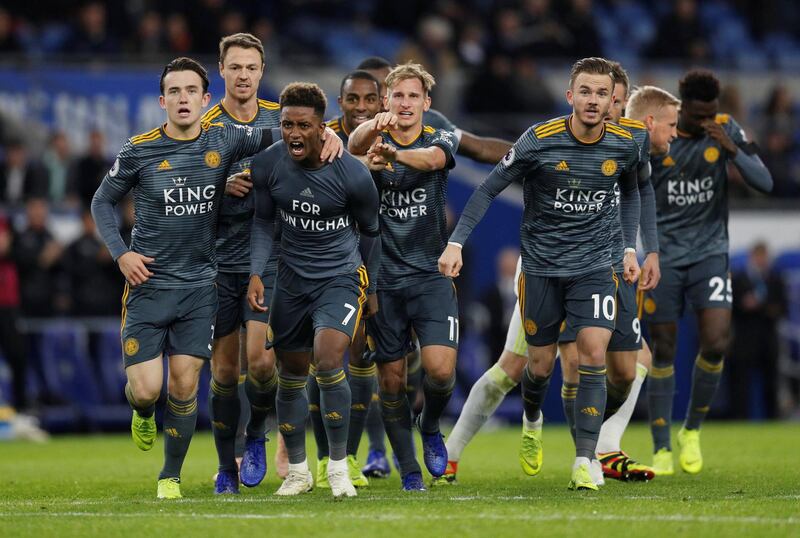 Cardiff City v Leicester City - Cardiff City Stadium, Cardiff, Britain -  Leicester City's Demarai Gray celebrates scoring their first goal, with team mates, wearing a shirt in remembrance of Vichai Srivaddhanaprabha, late chairman of Leicester City Football Club. Reuters