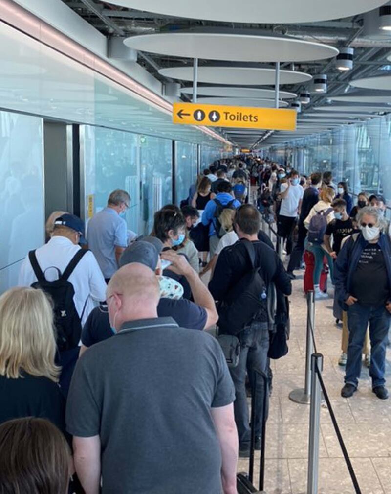 Picture taken with permission from the twitter account of @johnny_sutton of people queing at Heathrow Terminal 5 as passengers were delayed for several hours at airports across the UK as self-service passport gates stopped working. Picture date: Friday September 24, 2021.