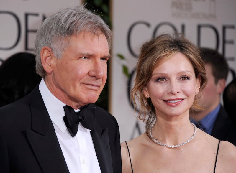 epa03061776 US actor Harrison Ford (L) and wife US actress Calista Flockhart (R) arrive for the 69th Golden Globe Awards held at the Beverly Hilton Hotel in Beverly Hills, Los Angeles, California, USA, 15 January 2012.  EPA/PAUL BUCK *** Local Caption ***  03061776.jpg