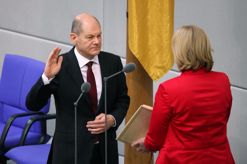Olaf Scholz takes his oath of office from Bundestag President Baerbel Bas at the Bundestag on December 8, 2021. Getty Images