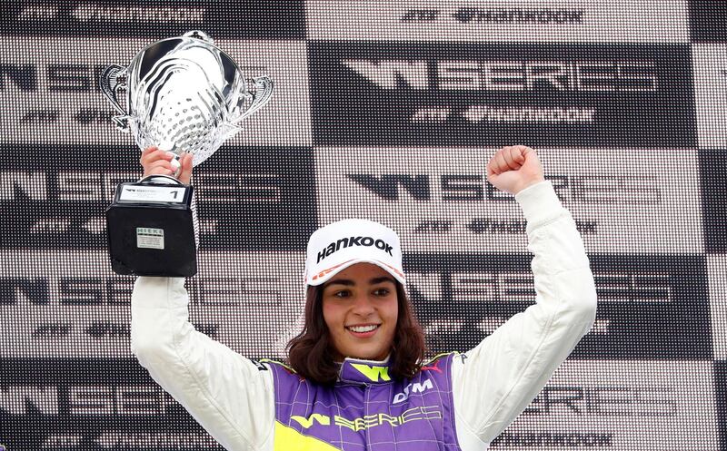 FILE PHOTO: ON THIS DAY -- May 4  May 4, 2019 MOTOR RACING - Britain's Jamie Chadwick celebrates with a trophy after winning the opening race of the inaugural season of the new all-female W Series in Hockenheim, Germany.  She was presented with her prize by South African Desire Wilson, who made history in 1980 when she beat a field of men to win a non-championship British Formula One race.  Chadwick would finish on the podium five times in the six-race championship to become the first W Series champion in August. REUTERS/Kai Pfaffenbach
