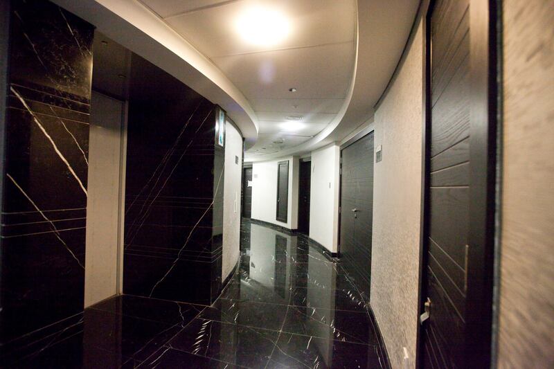 Dubai, United Arab Emirates - June 11 2013 - The interior corridor of the 7th floor at the Cayan Tower in the Dubai Marina.  (Razan Alzayani / The National)