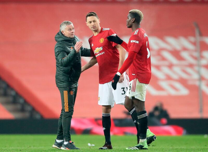 Manchester United's Paul Pogba (R), Nemanja Matic (C) and manager Ole Gunnar Solskjaer (L) celebrate  the win. EPA