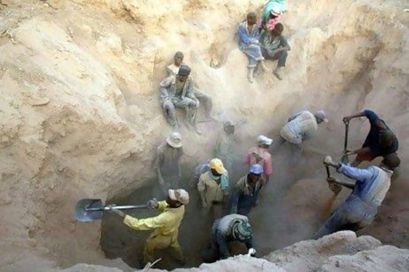 Miners dig for diamonds in Marange, Zimbabwe. AP Photo/Tsvangirayi Mukwazhi