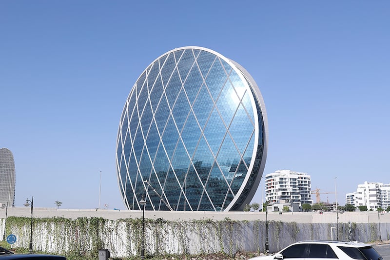 Aldar headquarters in Abu Dhabi. The company reported a robust rise in 2021 income on record development sales. Khushnum Bhandari / The National