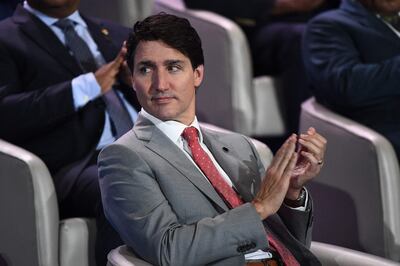 Canadian Prime Minister was at the Commonwealth summit in Rwanda before travelling to the G7. AFP 