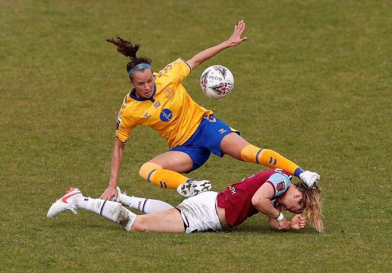 Everton's Rikke Sevecke tangles with Martha Thomas of West Ham United during the Women's Super League match at the Chigwell Construction Stadium in London on Sunday, April 25. Reuters