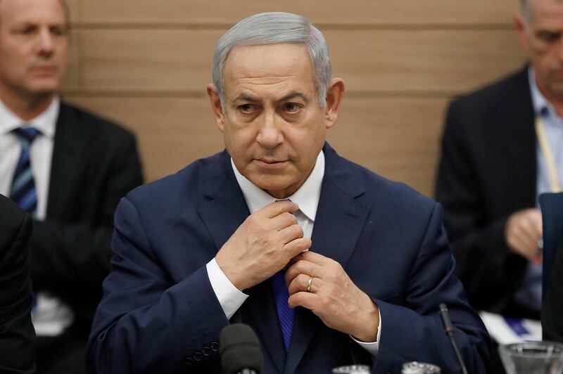 epa07176684 Israeli Prime Minister Benjamin Netanyahu as he listens to the Foreign Affairs and Defense Committee for the first time as Minister of Defense of Israel in the Israeli Knesset, (Israeli Parliament), in Jerusalem, 19 November 2018. Media reports state that the Netanyahu government will not go to early elections after Naftali Bennett and Ayelet Shaked of the Jewish Home Party decided not to resign from the coalition. The elections are scheduled to take place in November 2019  EPA/ABIR SULTAN