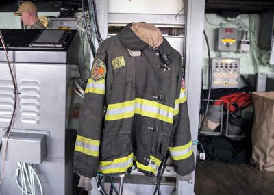 ABU DHABI, UNITED ARAB EMIRATES. 20 FEBRUARY 2020. 
Firefighter Bill Butler’s jacket which he wore on 9/11, is currently on board of transport dock ship USS New York (LPD 21) in Mina Zayed Port.

The ship’s bow stem includes seven and a half tons of steel recovered from the World Trade Center's twin towers.

1,200 Louisiana workers stayed to keep building the ship after Hurricane Katrina hit the shipyard in August 2005.

Ship’s motto is: "Strength forged through sacrifice. Never forget."

(Photo: Reem Mohammed/The National)

Reporter:
Section: