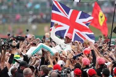 Mercedes driver Lewis Hamilton celebrates winning the British Grand Prix at Silverstone in 2019.  This year’s race will take place without fans. PA