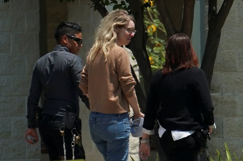 Theranos founder Elizabeth Holmes arrives to begin serving her prison sentence at the Federal Prison Camp in Bryan, Texas. Reuters