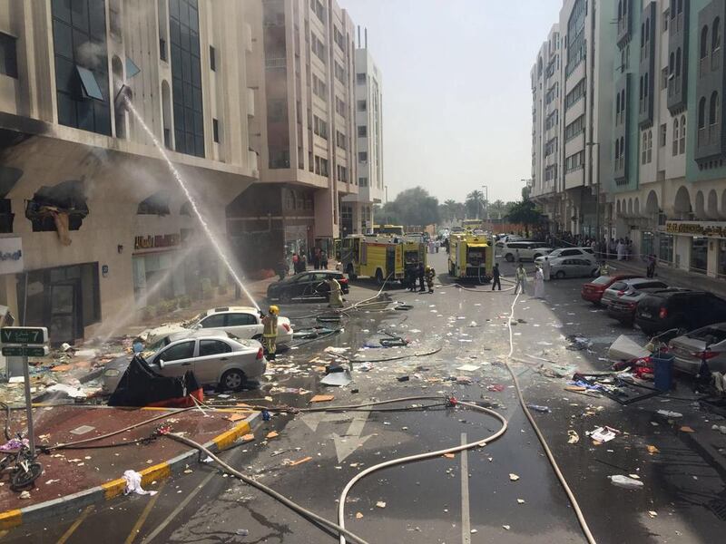 Fifteen people were injured after an explosion in a building in Abu Dhabi’s Al Khalidiya on Monday, believed to have been caused by a gas cylinder. The blast blew out windows, damaged nearby cars and forced residents to flee. Courtesy Security Media