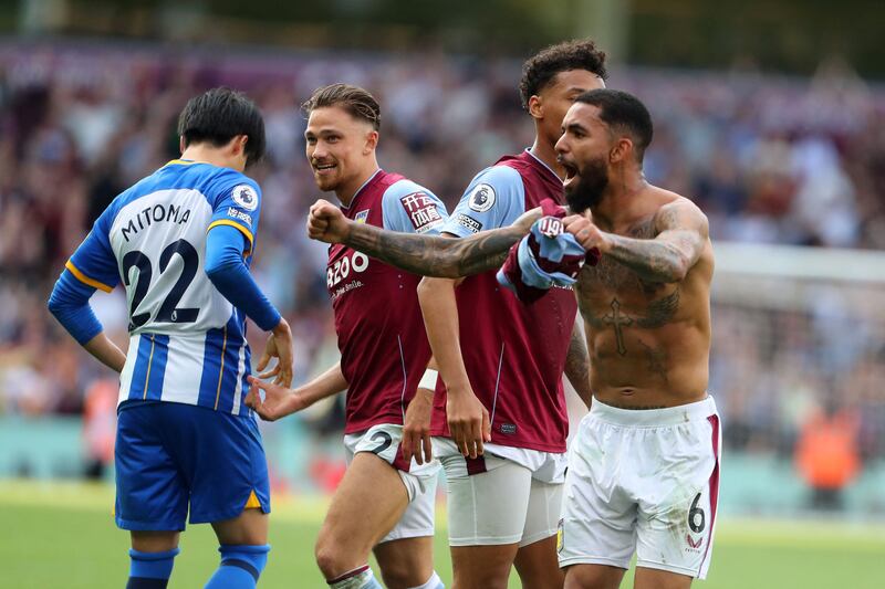 Aston Villa players celebrate after their match against Brighton and Hove Albion. AFP