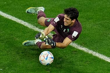 Morocco's goalkeeper Yassine Bounou saves a penalty kick during the World Cup round of 16 soccer match between Morocco and Spain, at the Education City Stadium in Al Rayyan, Qatar, Tuesday, Dec.  6, 2022.  (AP Photo / Abbie Parr)