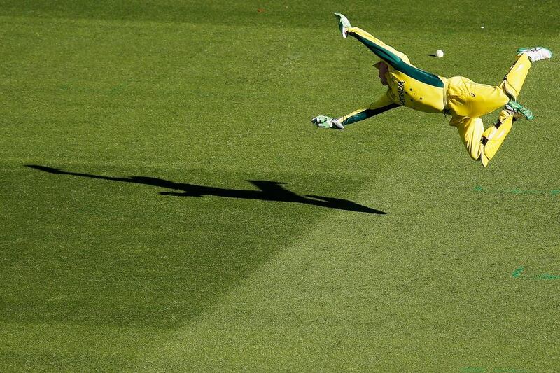 Australia wicketkeeper Brad Haddin dives for a ball. Darrian Traynor / Getty Images