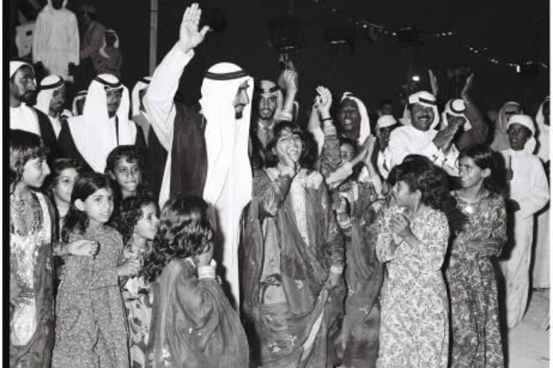 An image from the Itihad archive. Courtesy Al Itihad.
Abu Dhabi, UAE. 1975. Sheikh Zayed celebrating Eid with locals.
 *** Local Caption ***  000025.JPG