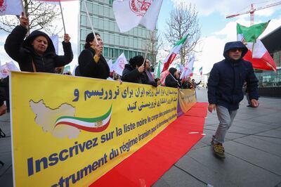 Iranian opposition supporters call for the IRGC to be listed as terrorists in a rally in Luxembourg this week. EPA 